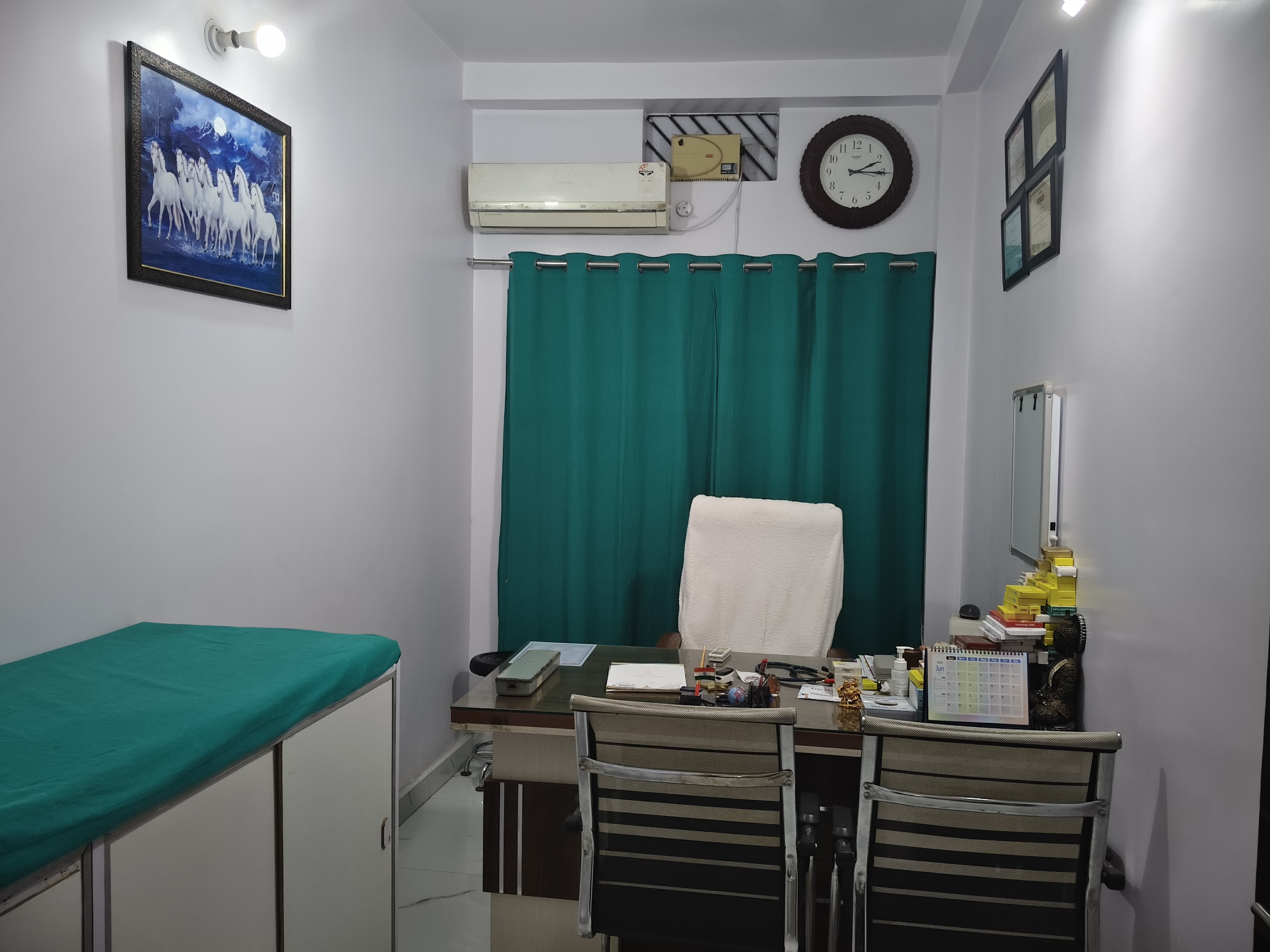 Consultation room with examination bed